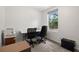 Home office with desk, two chairs, and window at 16637 Livingston Ave, Lutz, FL 33559
