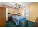 Bedroom with double bed, window, and closet at 16637 Livingston Ave, Lutz, FL 33559