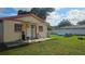 Backyard with patio, small pool, and picnic table at 2905 W Osborne Ave, Tampa, FL 33614