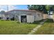 Backyard with shed and grassy area at 2905 W Osborne Ave, Tampa, FL 33614