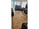 Living room with tile floors and comfortable reclining furniture at 2905 W Osborne Ave, Tampa, FL 33614