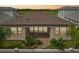 A spacious backyard has sliding glass doors and a manicured lawn at 8320 Golden Beach Ct, Parrish, FL 34219