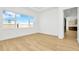 Bright bedroom with hardwood floors and view of the backyard at 8320 Golden Beach Ct, Parrish, FL 34219