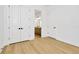 Spacious bedroom with double doors leading to the en-suite bathroom at 8320 Golden Beach Ct, Parrish, FL 34219