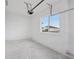 Bright, unfinished garage with a window overlooking the landscaped front yard at 8320 Golden Beach Ct, Parrish, FL 34219