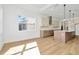 Modern kitchen with island and stainless steel appliances at 8320 Golden Beach Ct, Parrish, FL 34219