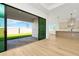 Living area with sliding doors opening to backyard at 8320 Golden Beach Ct, Parrish, FL 34219