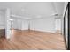 Bright, expansive living room with gleaming floors and recessed lighting at 8320 Golden Beach Ct, Parrish, FL 34219