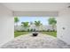 Covered patio with paver flooring and a fire pit, perfect for outdoor gatherings at 8320 Golden Beach Ct, Parrish, FL 34219