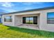 Covered patio with pavers and sliding glass doors at 8320 Golden Beach Ct, Parrish, FL 34219