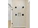 Shower with multiple shower heads and modern tile at 8320 Golden Beach Ct, Parrish, FL 34219