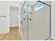 Walk-in shower with glass enclosure and multiple shower heads at 8320 Golden Beach Ct, Parrish, FL 34219