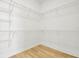 Large walk-in closet with wire shelving at 8320 Golden Beach Ct, Parrish, FL 34219