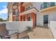 Balcony featuring seating and terracotta columns with partial view of beach at 16300 Gulf Blvd # 300B, Redington Beach, FL 33708