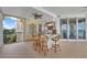 This spacious balcony features an outdoor kitchen with stainless steel grill and counter seating at 16300 Gulf Blvd # 300B, Redington Beach, FL 33708