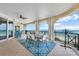 Spacious covered balcony provides stunning ocean views and has a dining area for entertaining at 16300 Gulf Blvd # 300B, Redington Beach, FL 33708