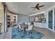 Covered ocean view balcony featuring a dining space and an outdoor kitchen area at 16300 Gulf Blvd # 300B, Redington Beach, FL 33708
