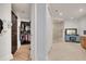 Bathroom featuring walk-in shower, vanity area, closet, and neutral tile flooring at 16300 Gulf Blvd # 300B, Redington Beach, FL 33708