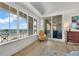 Cozy seating area with expansive windows offering stunning ocean views and bright natural light at 16300 Gulf Blvd # 300B, Redington Beach, FL 33708