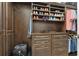 Custom closet with built-in shelving, drawers, and hanging rods for organized storage at 16300 Gulf Blvd # 300B, Redington Beach, FL 33708