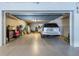 Spacious garage with epoxy flooring provides ample parking and storage at 16300 Gulf Blvd # 300B, Redington Beach, FL 33708