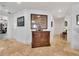 Inviting hallway with beautiful tile floors, decorative furniture, and access to various rooms at 16300 Gulf Blvd # 300B, Redington Beach, FL 33708