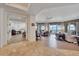 Open living and dining area with floor to ceiling windows and water views at 16300 Gulf Blvd # 300B, Redington Beach, FL 33708