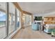 Bright living space with floor-to-ceiling windows offering stunning water views and natural light at 16300 Gulf Blvd # 300B, Redington Beach, FL 33708