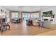 Bright living room with floor-to-ceiling windows and waterfront views, blending indoor-outdoor living spaces at 16300 Gulf Blvd # 300B, Redington Beach, FL 33708