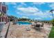 Inviting condo complex pool with elegant seating and ocean view at 16300 Gulf Blvd # 300B, Redington Beach, FL 33708