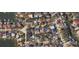 Aerial view showcasing home's location in a neighborhood at 5002 W Poe Ave, Tampa, FL 33629