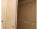 Bedroom closet with built-in shelves at 5125 Palm Springs Blvd # 1303, Tampa, FL 33647