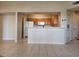 Open living room featuring tile floors and an open concept to the kitchen at 5125 Palm Springs Blvd # 1303, Tampa, FL 33647