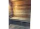 Inviting sauna interior featuring wooden benches and paneling, creating a relaxing and therapeutic experience at 5125 Palm Springs Blvd # 1303, Tampa, FL 33647