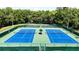 Aerial view of tennis courts, perfect for sports enthusiasts and community recreation at 5125 Palm Springs Blvd # 1303, Tampa, FL 33647