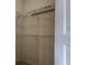 Interior view of a well-organized walk-in closet with wire shelving at 5125 Palm Springs Blvd # 1303, Tampa, FL 33647