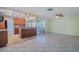 Spacious kitchen with granite countertops and wooden cabinets at 6359 Cocoa Ln, Apollo Beach, FL 33572