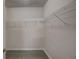 Large walk-in closet with wire shelving at 9538 Highland Ridge Dr, Hudson, FL 34667