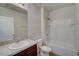 Bathroom with bathtub, shower, single vanity, and toilet at 9538 Highland Ridge Dr, Hudson, FL 34667