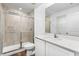 Clean bathroom with white vanity and a walk-in shower at 5473 Colfax Ter, Port Charlotte, FL 33981