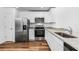 Modern kitchen featuring stainless steel appliances and granite countertops at 5473 Colfax Ter, Port Charlotte, FL 33981