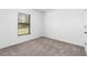 Empty bedroom with neutral wall paint and carpet at 12564 Feldman Ave, Port Charlotte, FL 33981