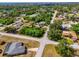 Aerial view of residential neighborhood showcasing homes and landscape at 1402 Viscaya Dr, Port Charlotte, FL 33952