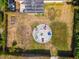 Overhead view of backyard fire pit and seating at 1402 Viscaya Dr, Port Charlotte, FL 33952