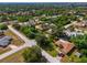 Aerial view of residential neighborhood showcasing homes and landscape at 1402 Viscaya Dr, Port Charlotte, FL 33952