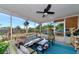 Relaxing screened porch with wicker furniture at 1402 Viscaya Dr, Port Charlotte, FL 33952