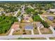 Aerial view of a single Gathering home and backyard at 1402 Viscaya Dr, Port Charlotte, FL 33952