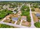 Aerial view of residential neighborhood showcasing houses and landscape at 1402 Viscaya Dr, Port Charlotte, FL 33952