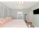 Spacious Primary bedroom with king-size bed and large window at 1402 Viscaya Dr, Port Charlotte, FL 33952