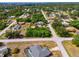 Aerial view of residential neighborhood showcasing homes and landscape at 1402 Viscaya Dr, Port Charlotte, FL 33952